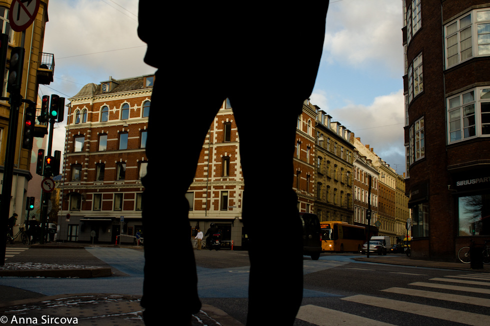 man's silhouette on a crosswalk in Copenhagen, Denmark